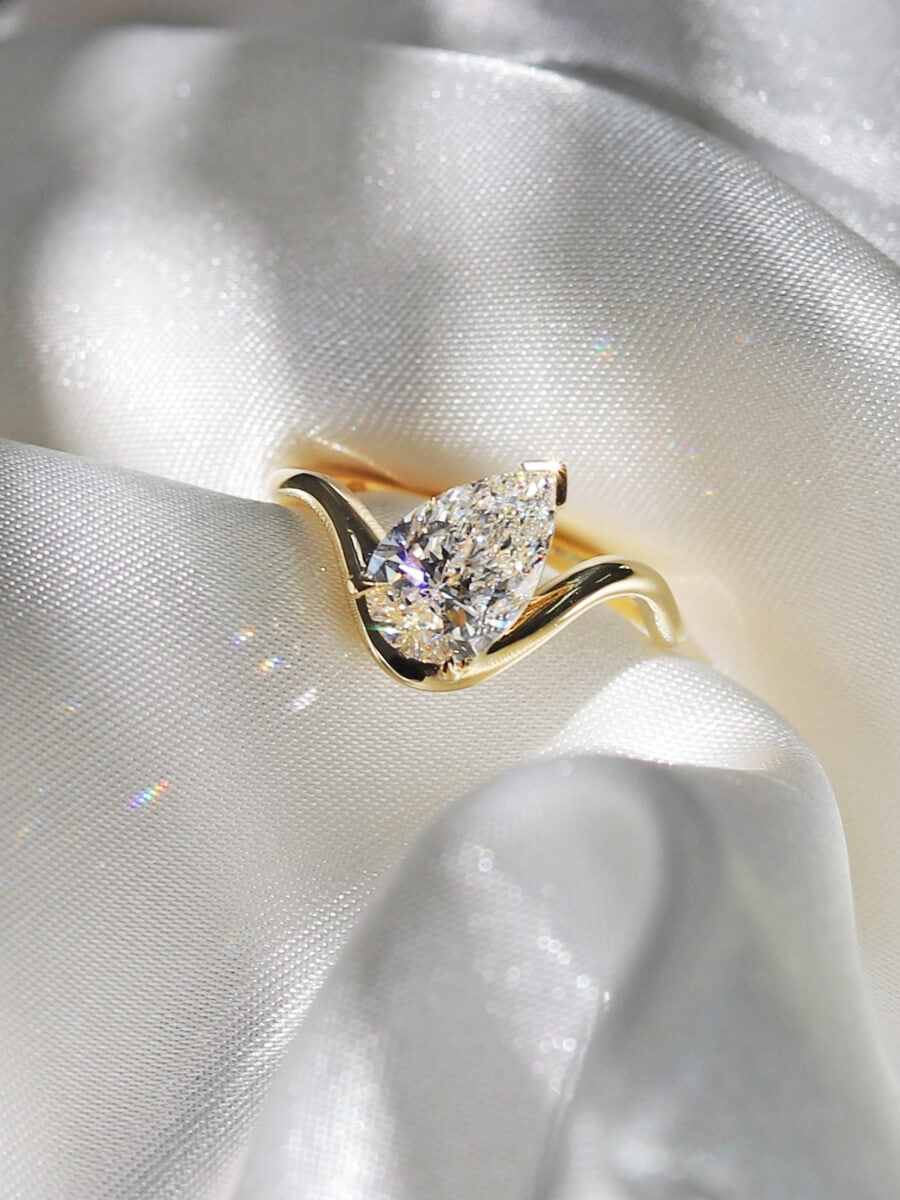 Diamond ring on ivory satin for My Jewellery Shop family tradition