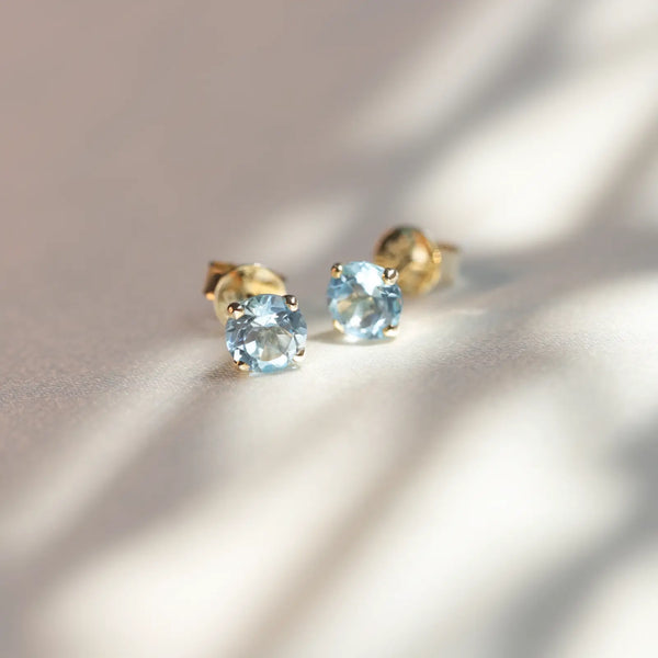 9ct Yellow Gold Blue Topaz Stud Earrings - alternate view
