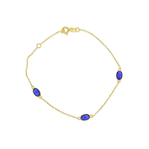 9ct Yellow Gold Bracelet Stationed With Oval Created Sapphires