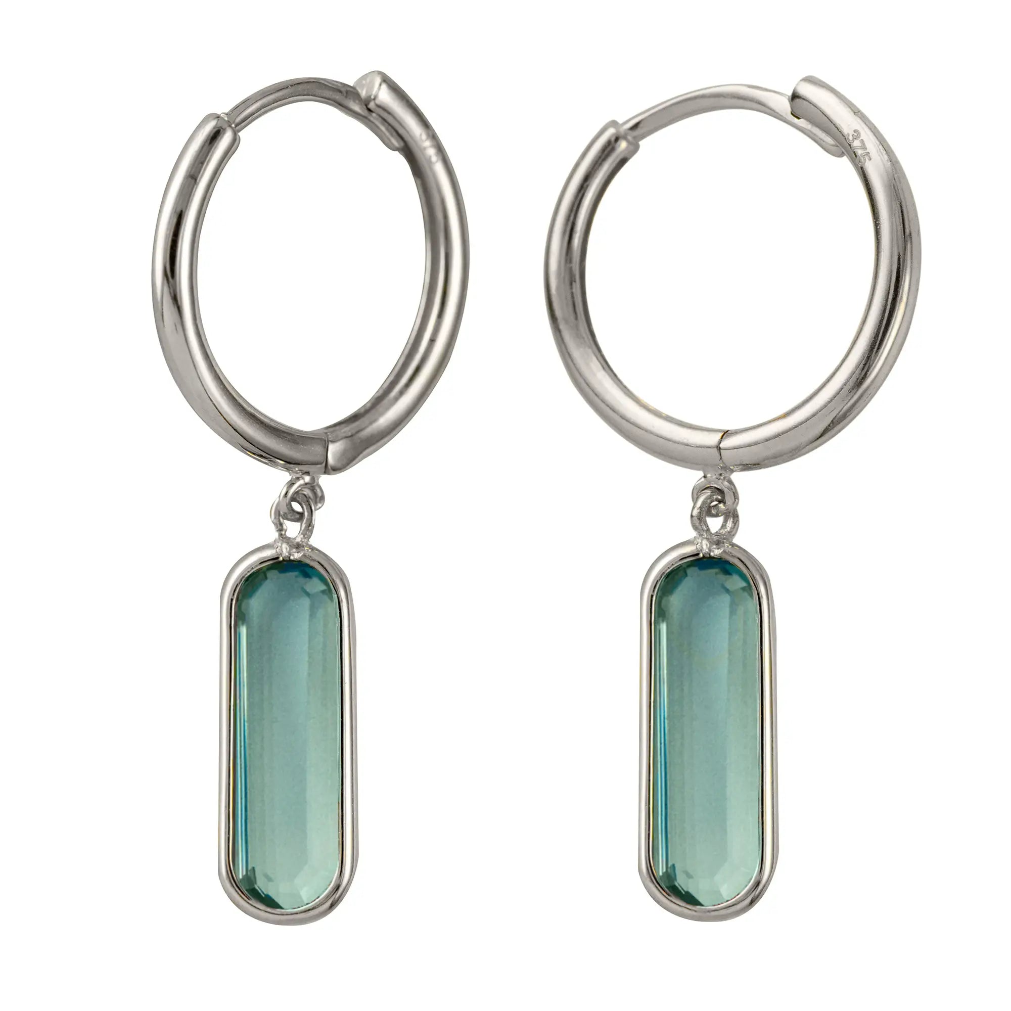 Sterling Silver Huggie Earrings With Oval Topaz Drop