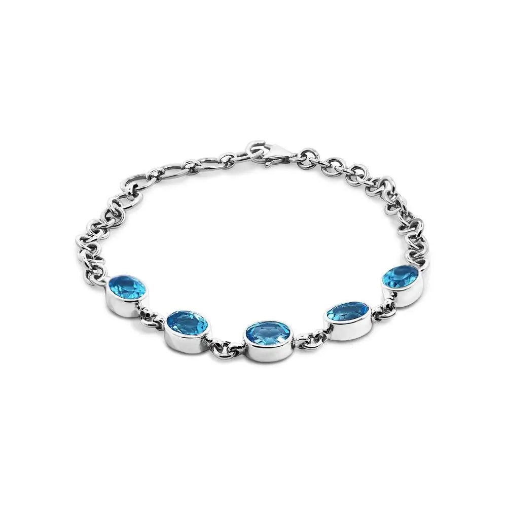 Sterling Silver Oval Bezel Set Blue Topaz Bracelet