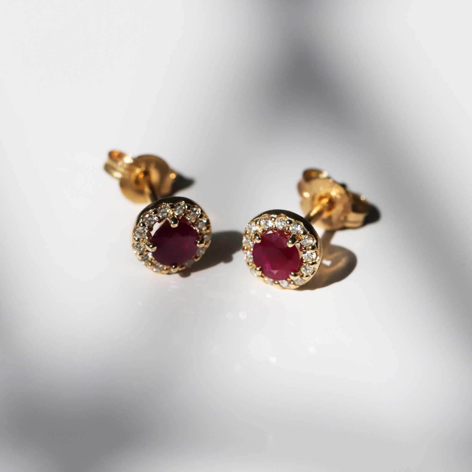 9ct Yellow Gold Ruby Stud Earrings With Diamond Halo My Jewellery Shop