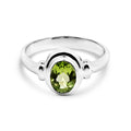 Sterling Silver Oval Peridot Ring With Double Bezel Setting